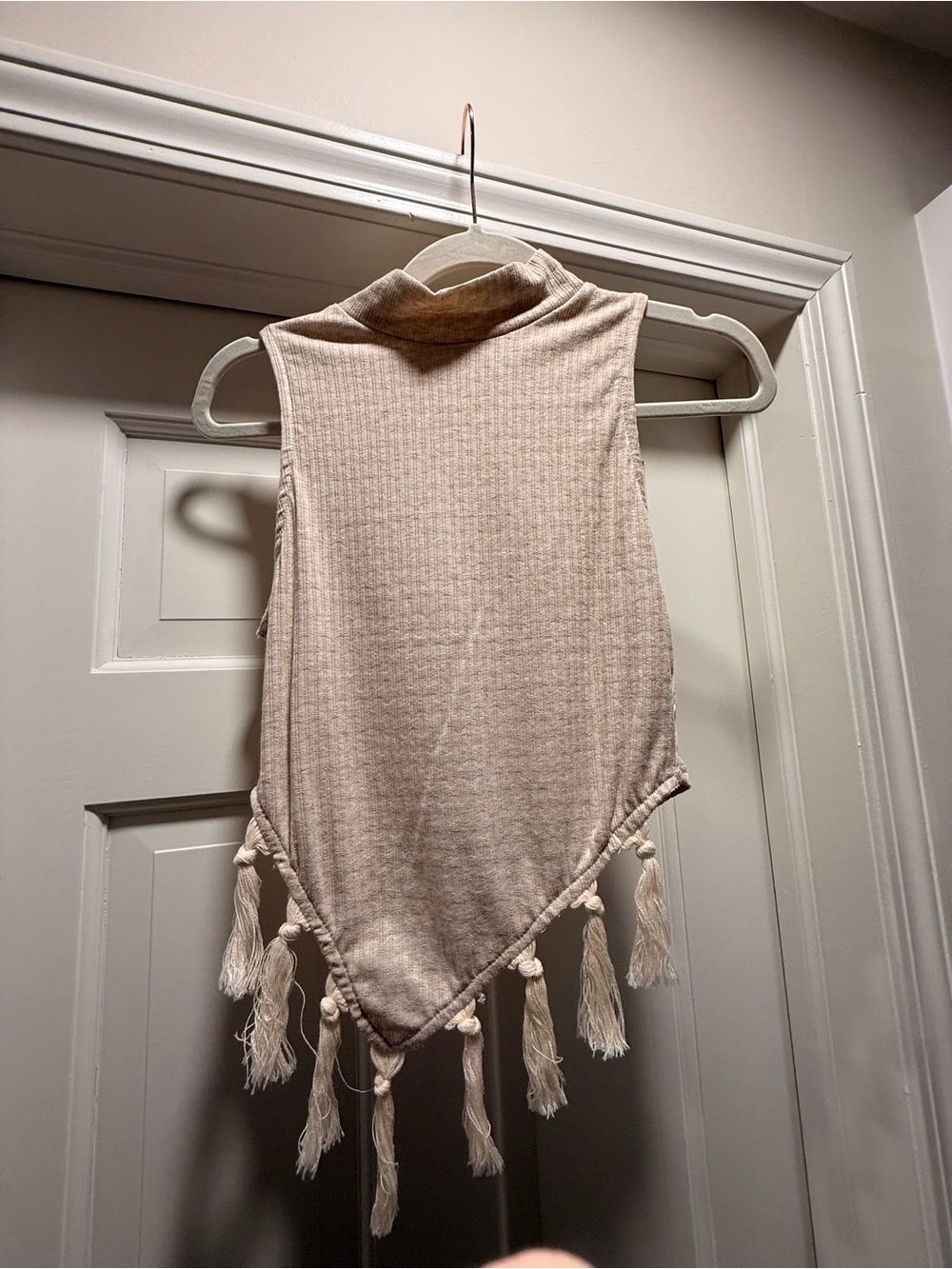 Sleeveless Turtleneck Tassel Hem Top - Cream